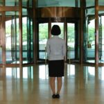 women's white long-sleeved shirt and black skirt